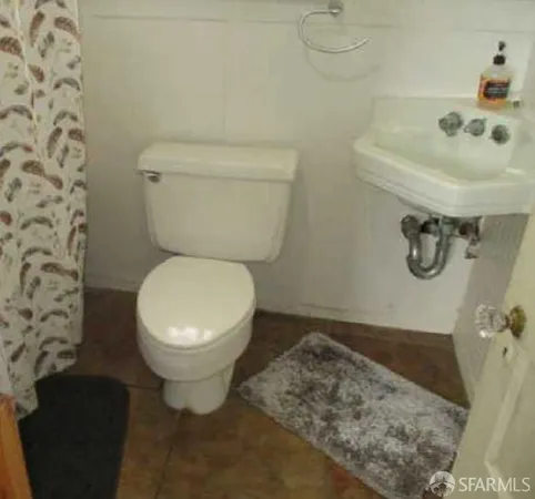 a bathroom with a sink and a toilet