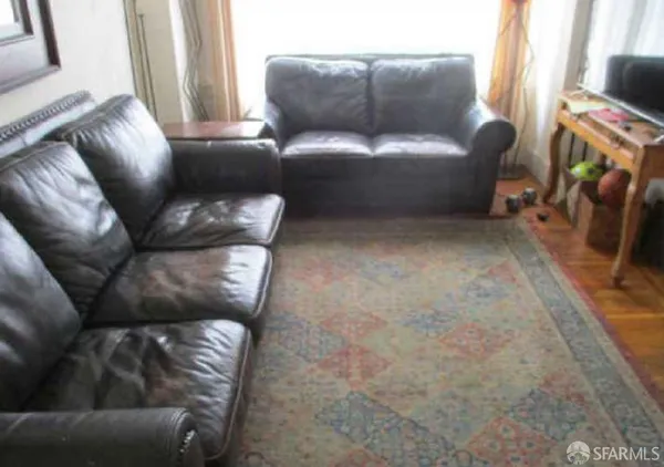 a living room with furniture and a couch