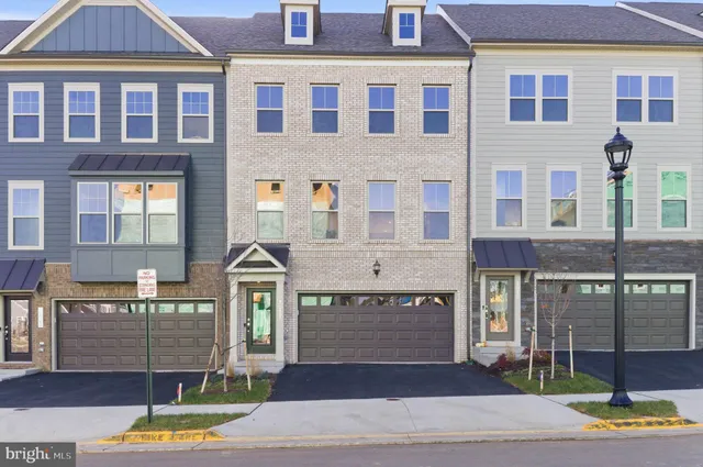 a front view of a building with garden