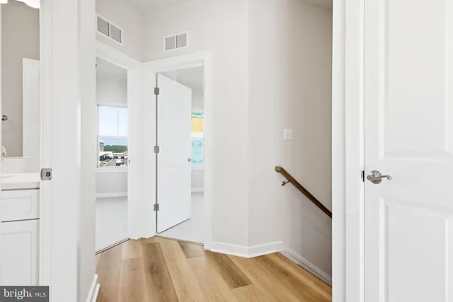 a bathroom with a shower and a sink