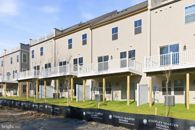 a view of a park with swings and slides