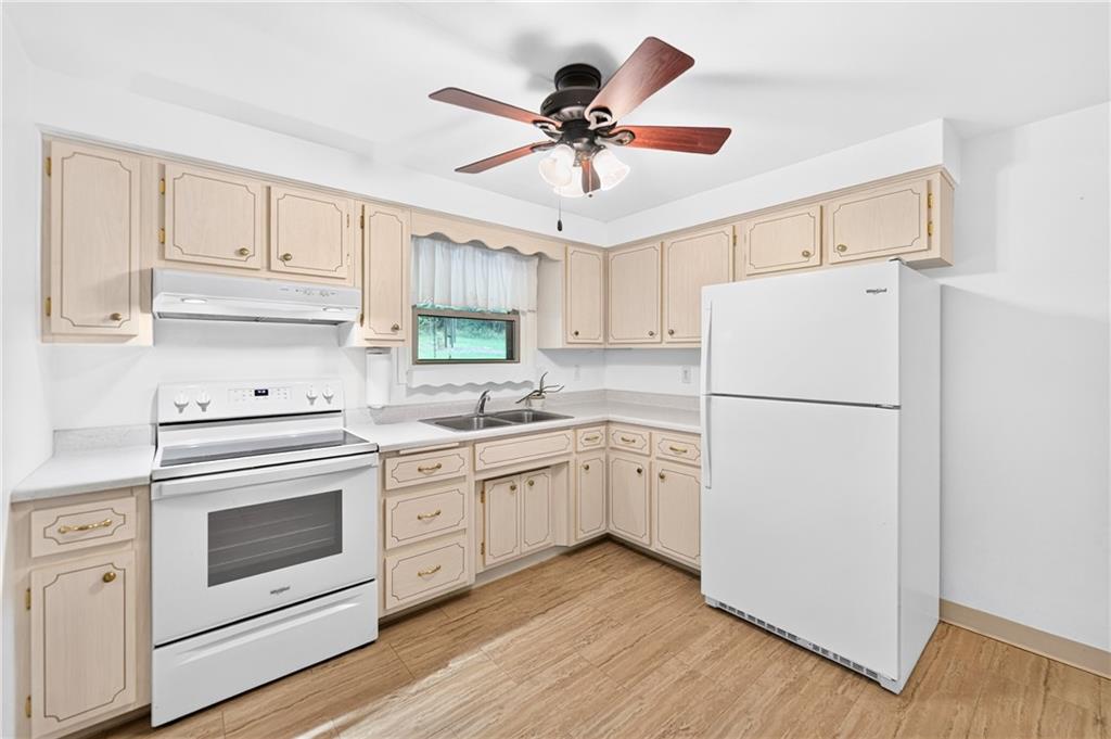 224 Bowman Road Bridgeville, PA 15017 - Photo 13 of 50 The kitchen is the heart og this home. Two entrances allow an easy, seamless flow for guests and every day use. There's plenty of space for an eat-in table, bar height table or coffee station for the morning pick-me up!
