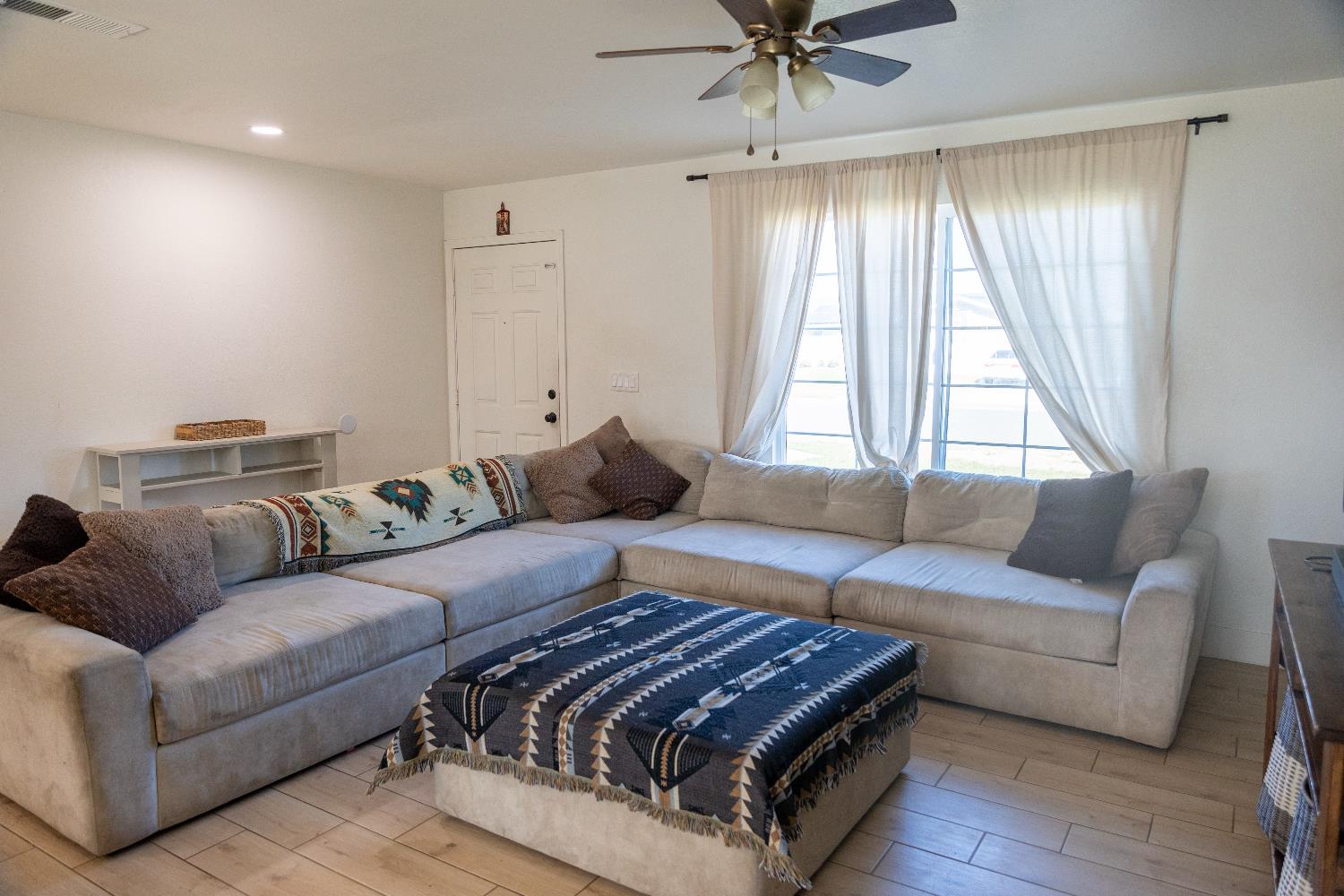 1612 Larry Street Olivehurst, CA 95961 - Photo 15 of 27 a living room with furniture and a window