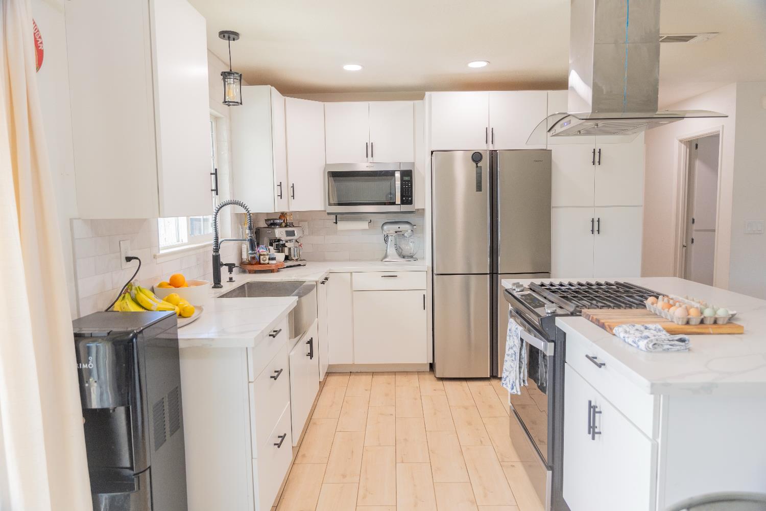 1612 Larry Street Olivehurst, CA 95961 - Photo 17 of 27 a kitchen with a sink stove and refrigerator