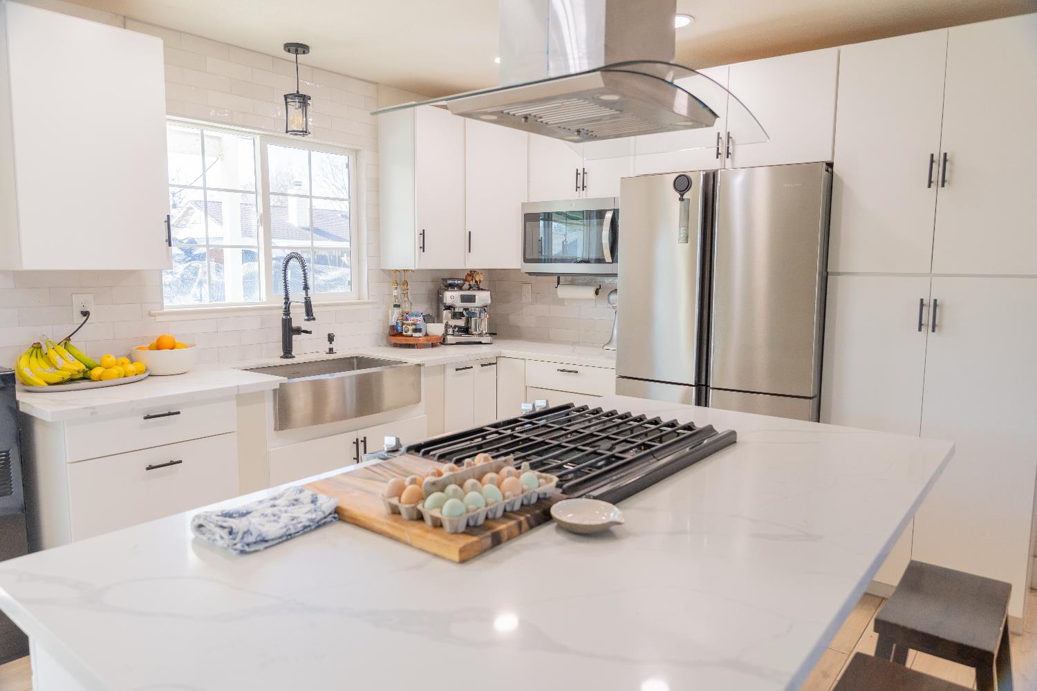 1612 Larry Street Olivehurst, CA 95961 - Photo 18 of 27 a kitchen with stainless steel appliances a refrigerator sink and cabinets