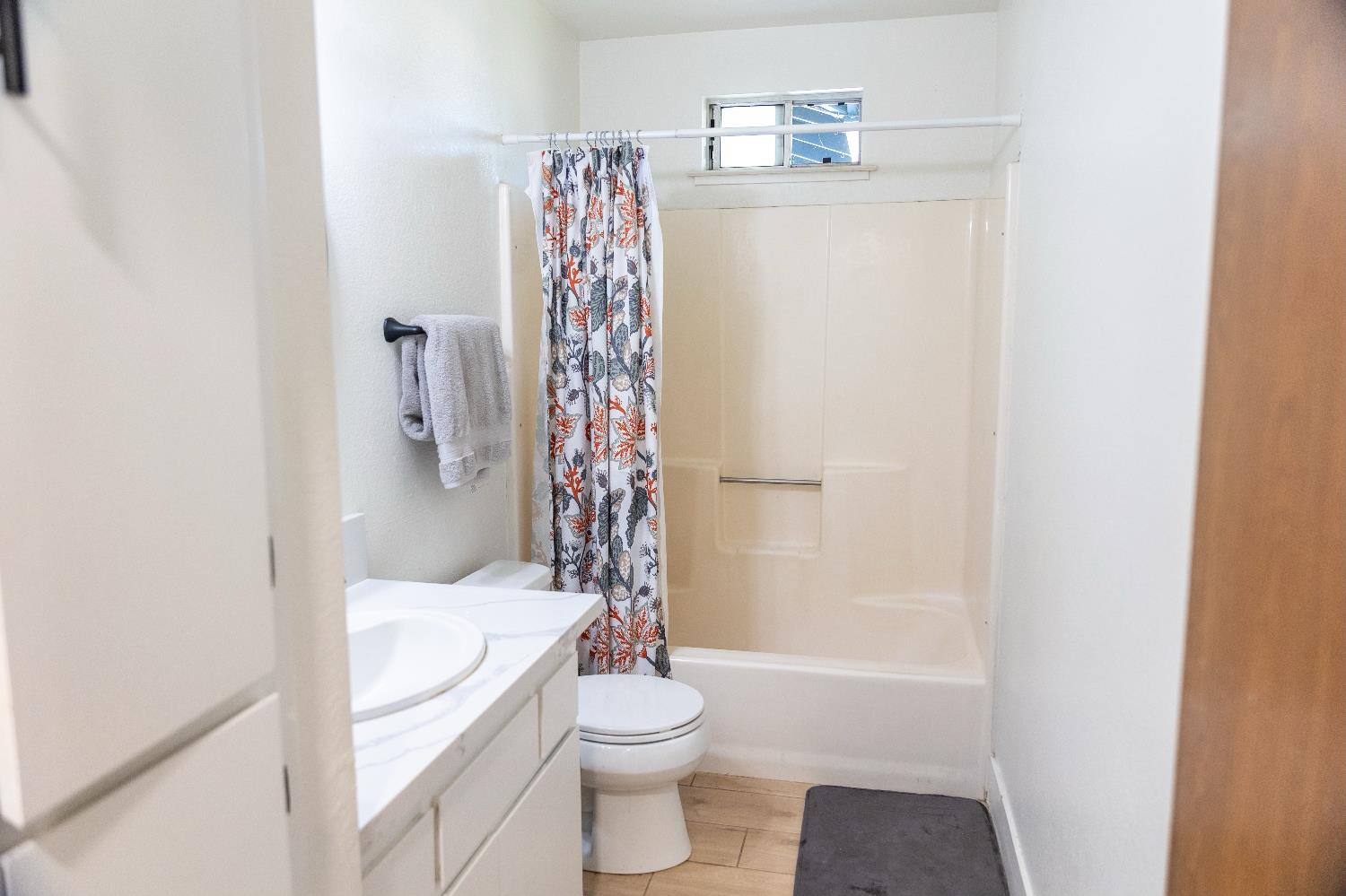 1612 Larry Street Olivehurst, CA 95961 - Photo 20 of 27 a bathroom with a shower toilet and sink