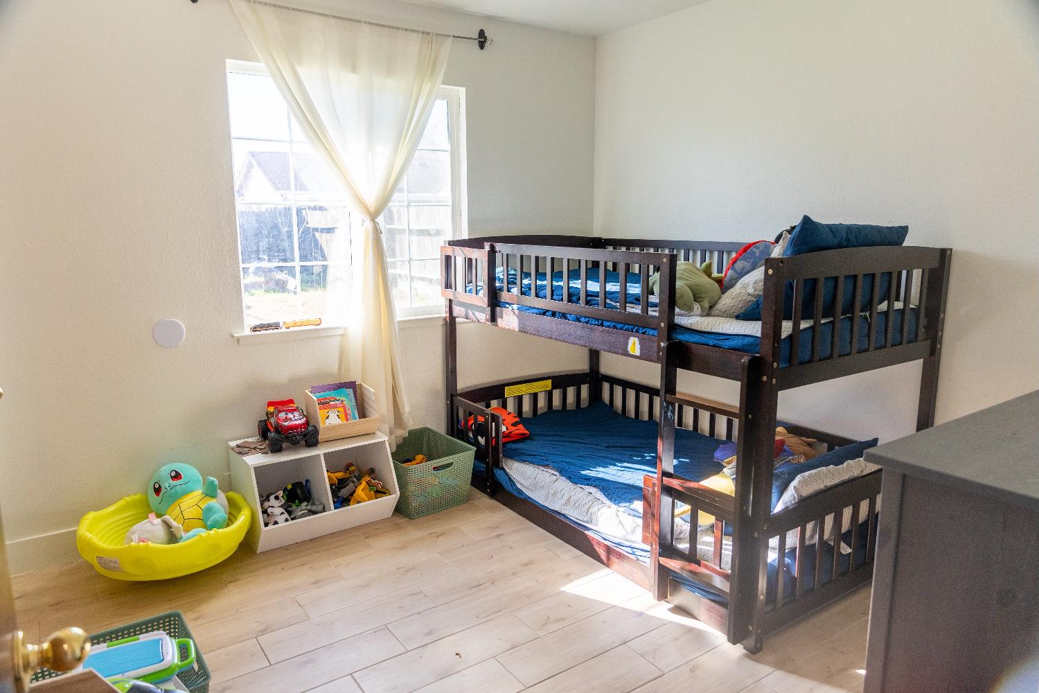 1612 Larry Street Olivehurst, CA 95961 - Photo 22 of 27 a bedroom with furniture and a window