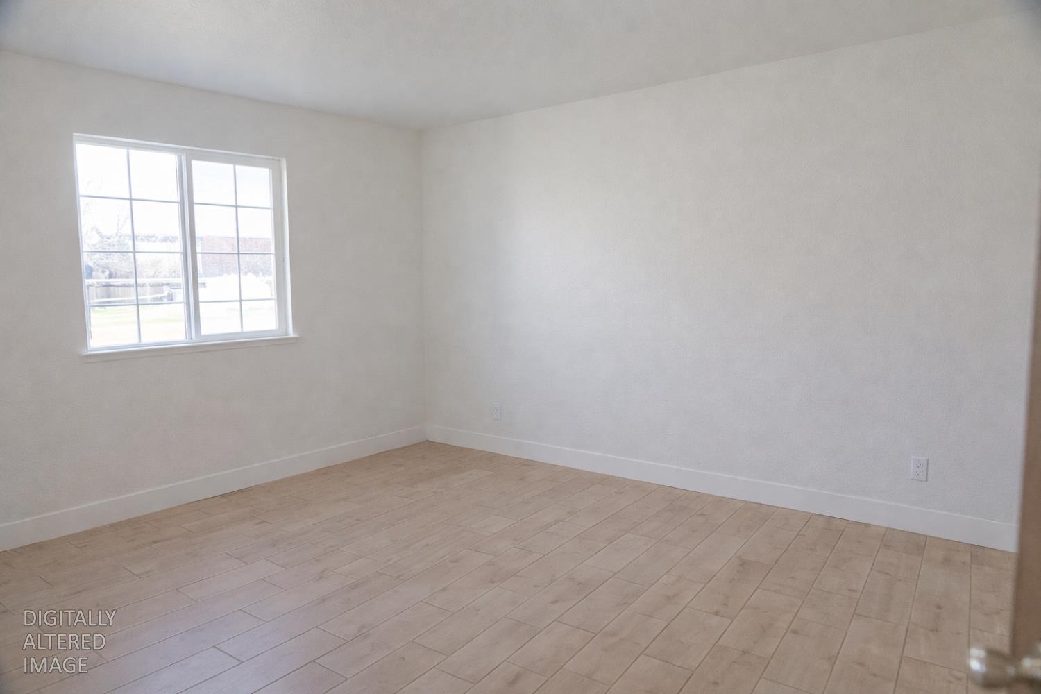 1612 Larry Street Olivehurst, CA 95961 - Photo 7 of 27 an empty room with a window