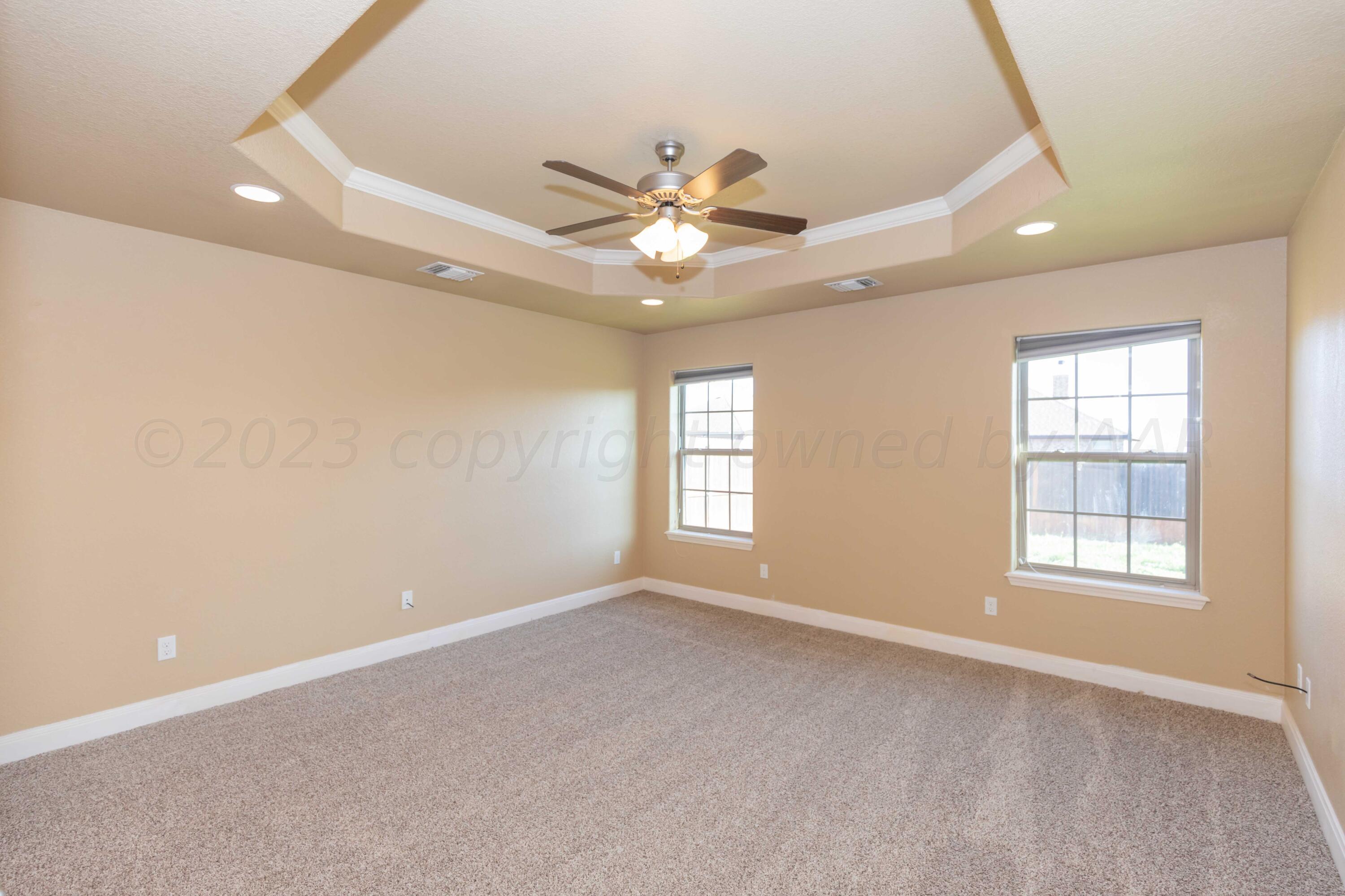 3904 Arden Road Amarillo, TX 79118 - Photo 18 of 45 a view of an empty room with a window