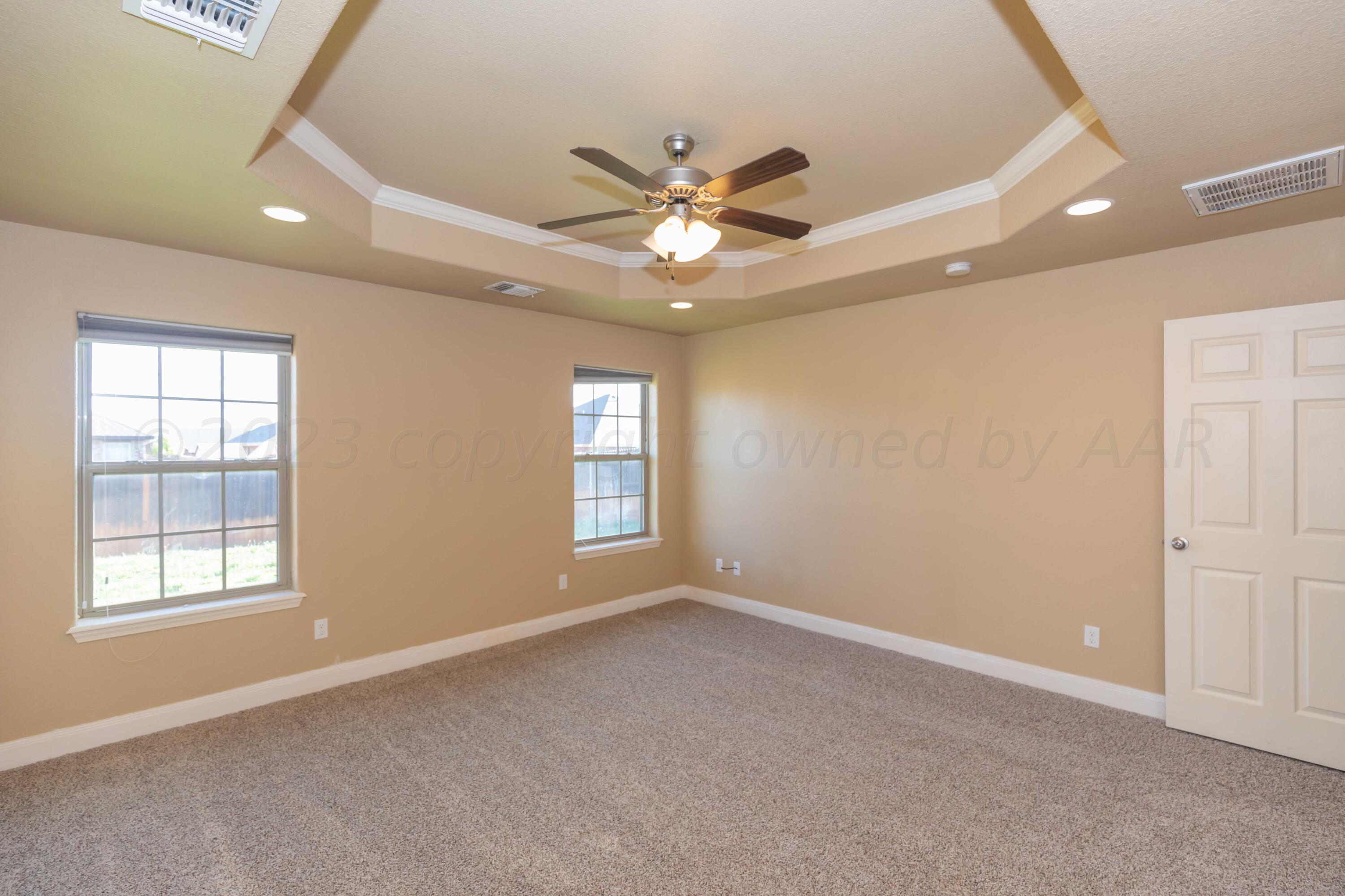 3904 Arden Road Amarillo, TX 79118 - Photo 21 of 45 a view of an empty room with a window