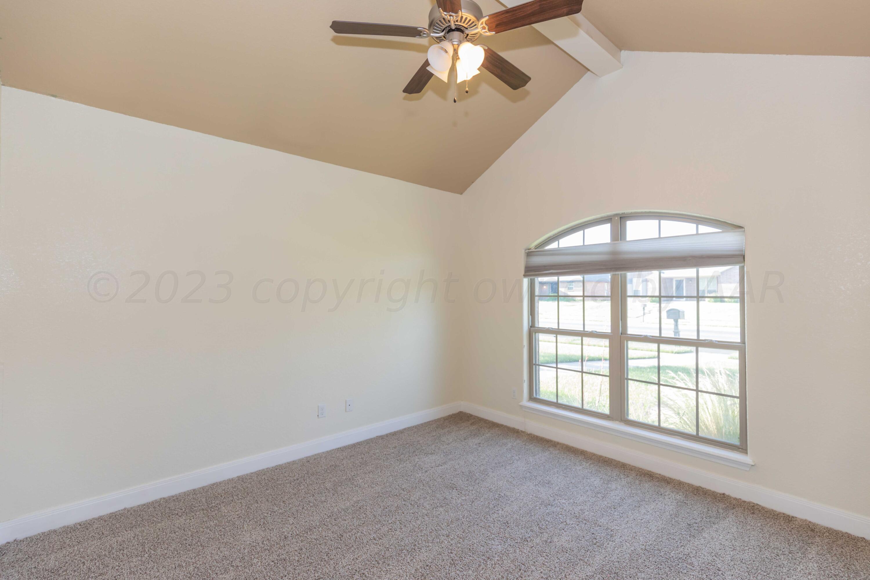 3904 Arden Road Amarillo, TX 79118 - Photo 30 of 45 an empty room with a window