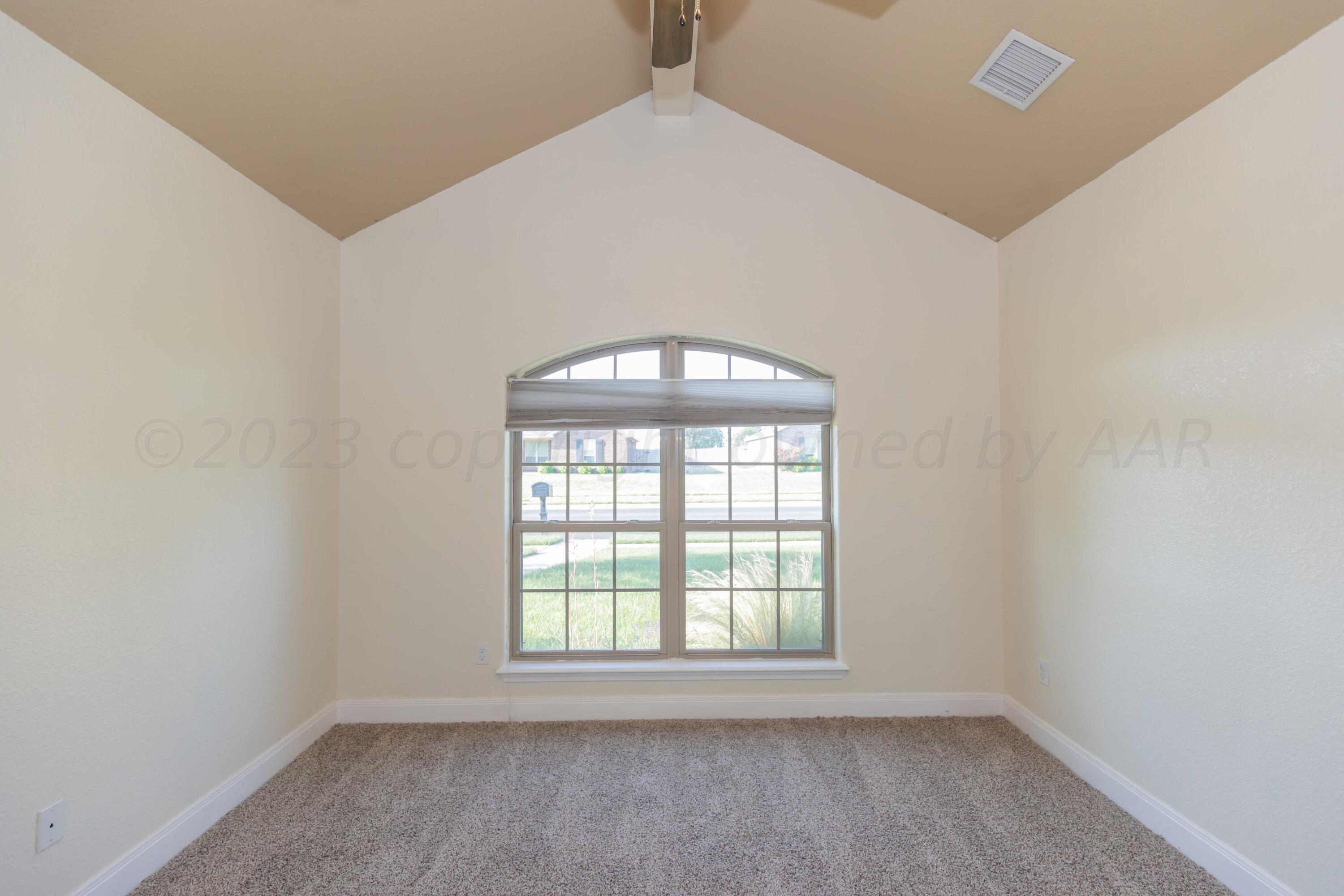 3904 Arden Road Amarillo, TX 79118 - Photo 33 of 45 an empty room with a window