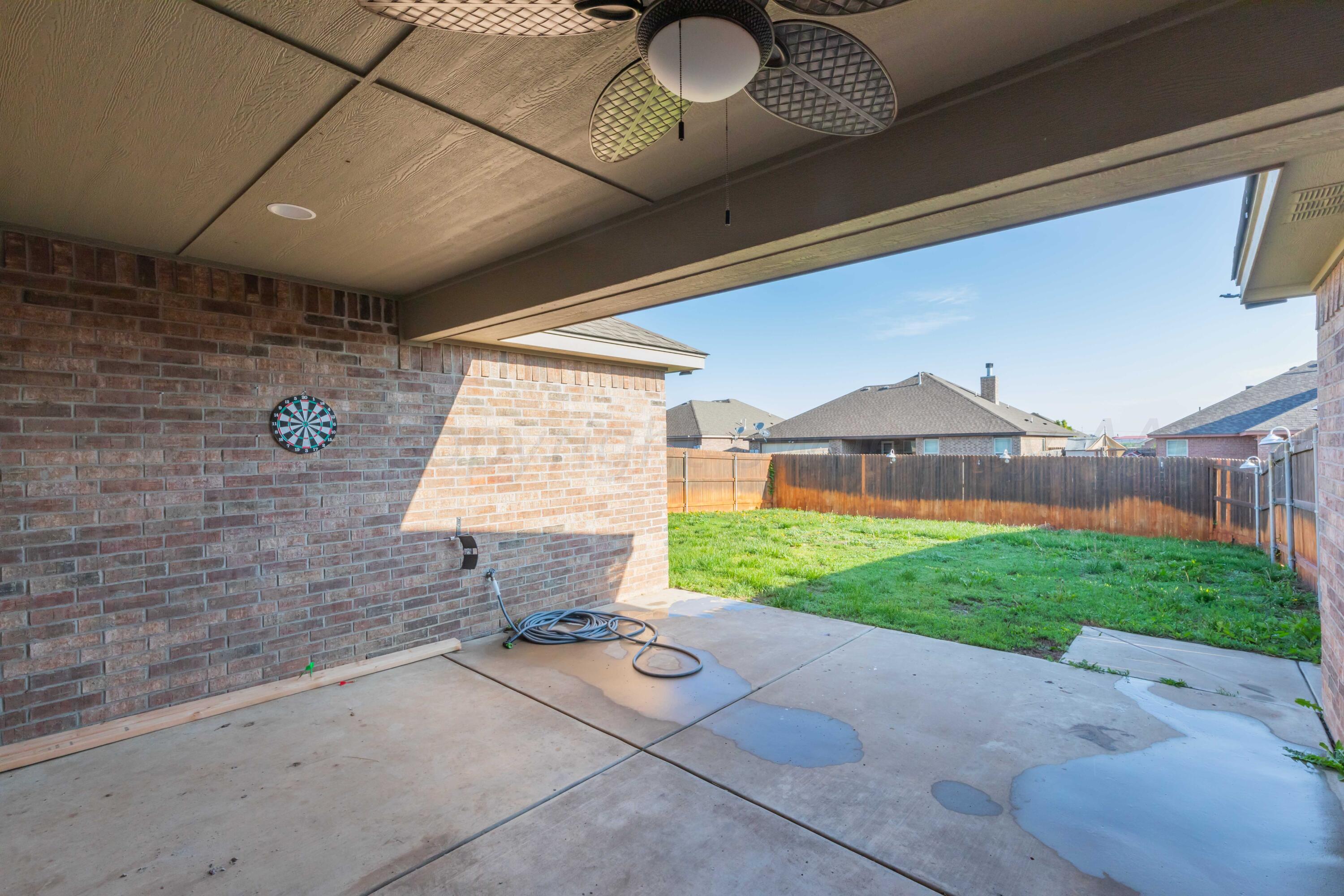 3904 Arden Road Amarillo, TX 79118 - Photo 43 of 45 a front view of a house with garden