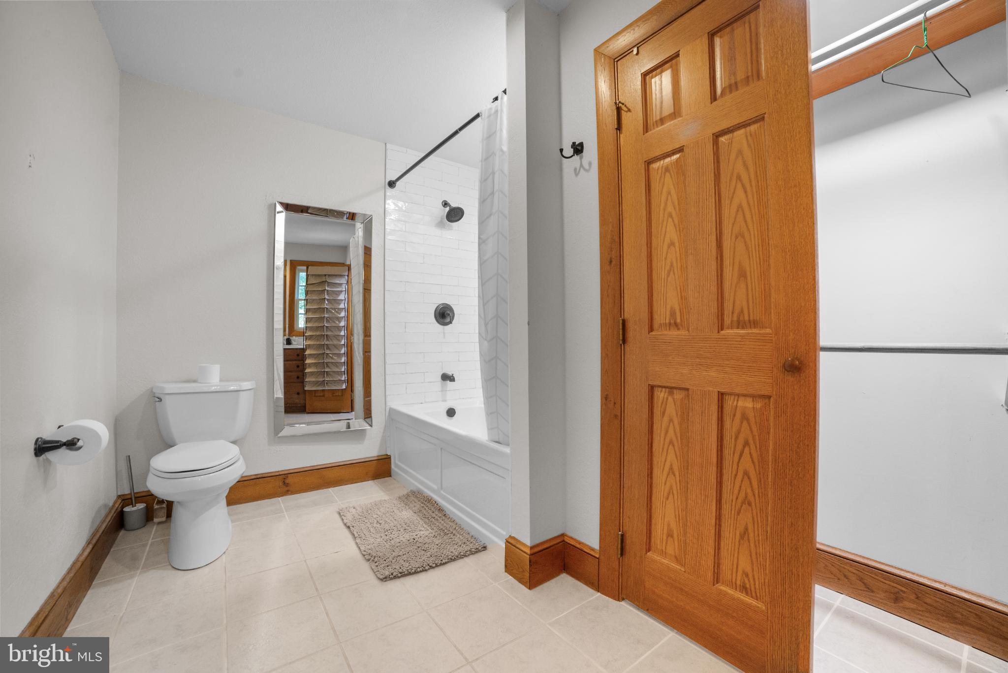 1318 Locust Grove Church Road Orange, VA 22960 - Photo 16 of 42 Modern bathroom with classic wooden accents.