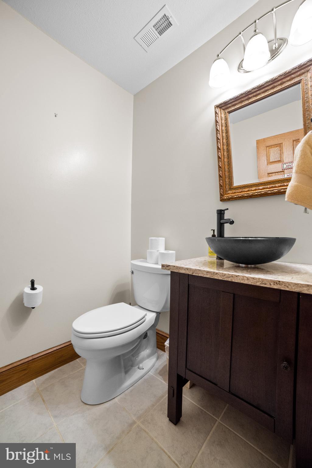 1318 Locust Grove Church Road Orange, VA 22960 - Photo 20 of 42 Elegant half bathroom with modern fixtures.
