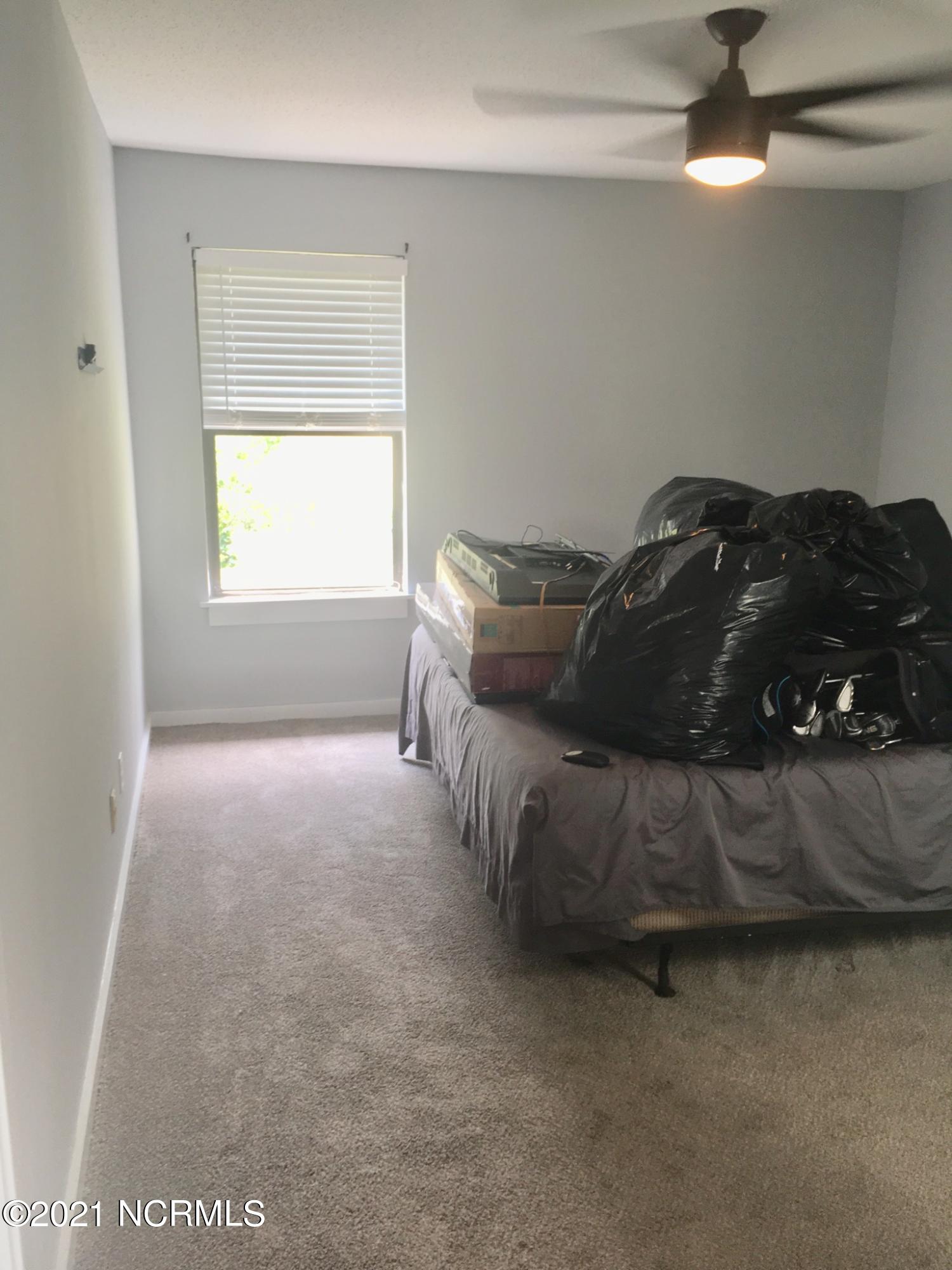 718 Azalea Drive, Unit 458 Hampstead, NC 28443 - Photo 12 of 14 Master Bedroom