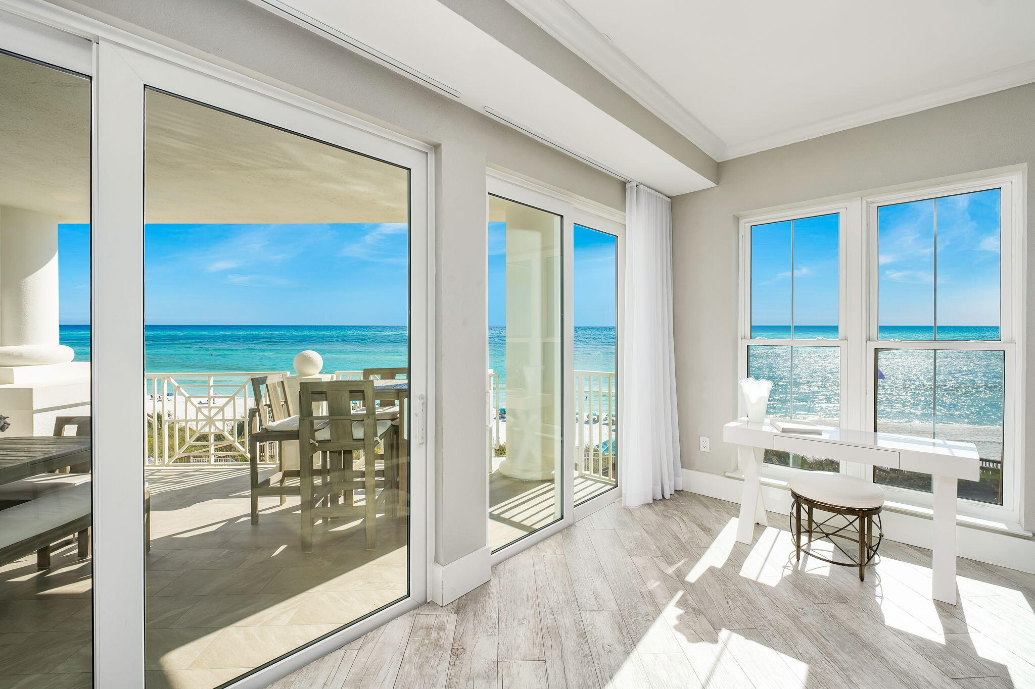 164 Blue Lupine Way, Unit 313 Santa Rosa Beach, FL 32459 - Photo 14 of 57 a living room with furniture and a floor to ceiling window