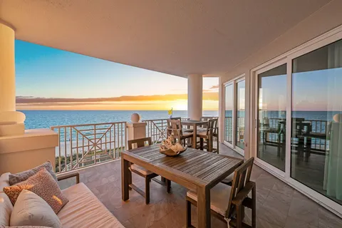 a view of balcony and wooden floor