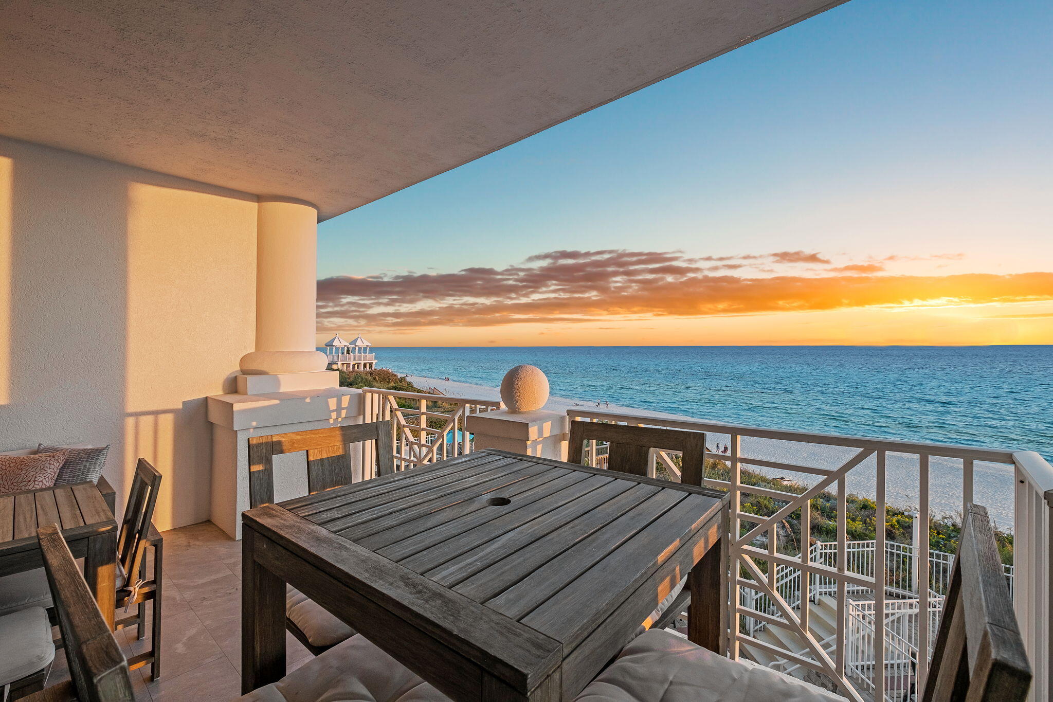 164 Blue Lupine Way, Unit 313 Santa Rosa Beach, FL 32459 - Photo 21 of 57 a terrace of a house with wooden floor outdoor seating and city view