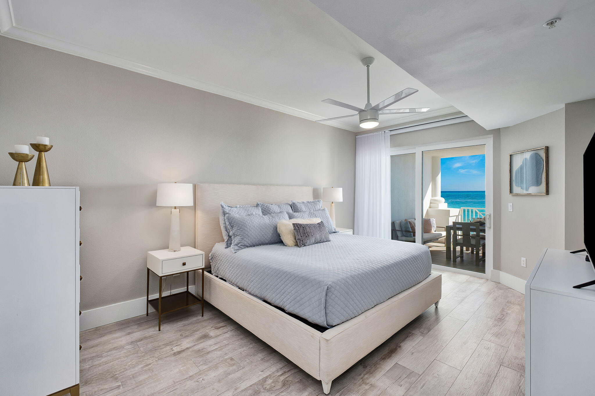 164 Blue Lupine Way, Unit 313 Santa Rosa Beach, FL 32459 - Photo 26 of 57 a bedroom with a bed and a chandelier