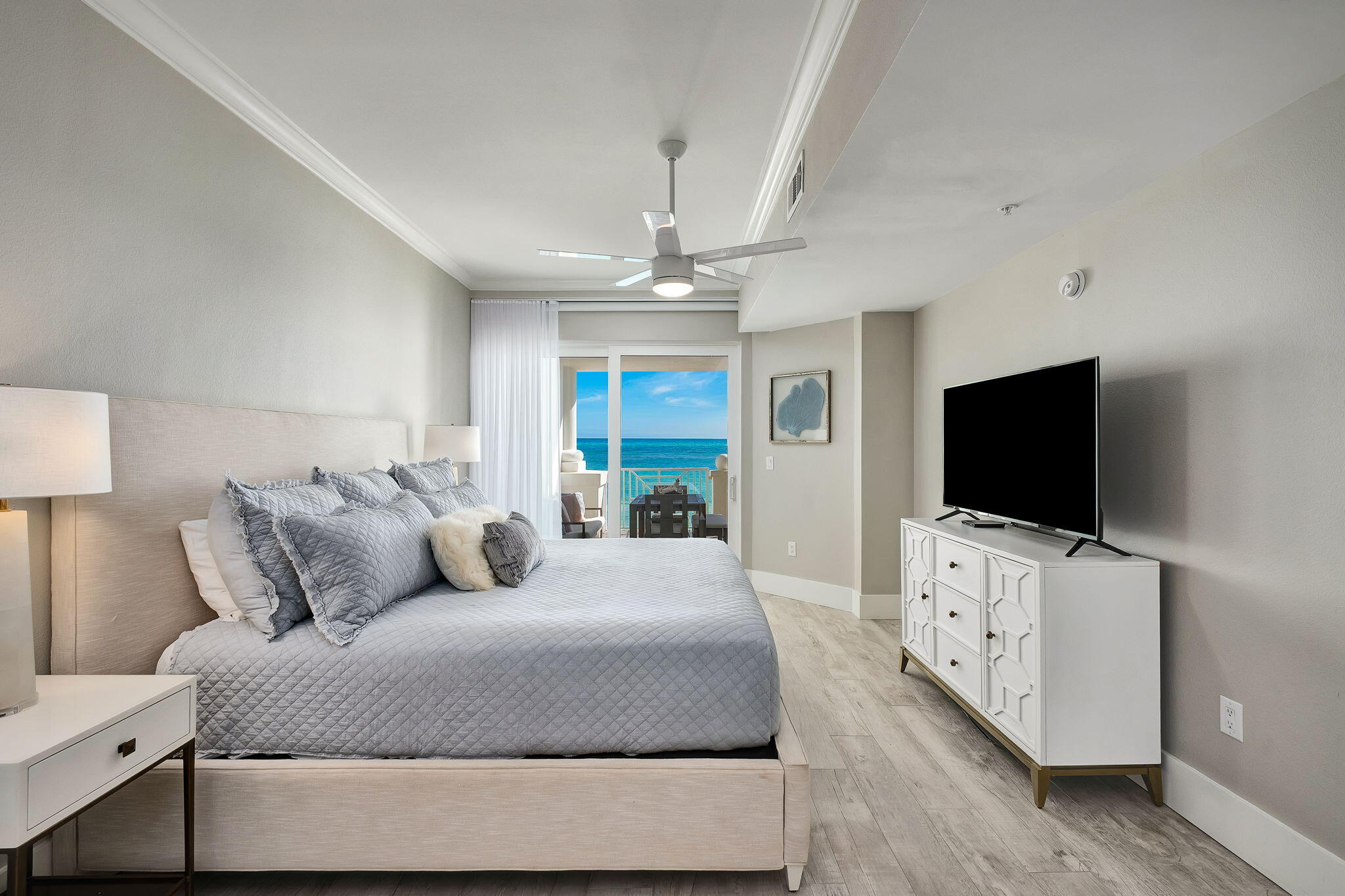 164 Blue Lupine Way, Unit 313 Santa Rosa Beach, FL 32459 - Photo 27 of 57 a bedroom with a bed and a flat screen tv