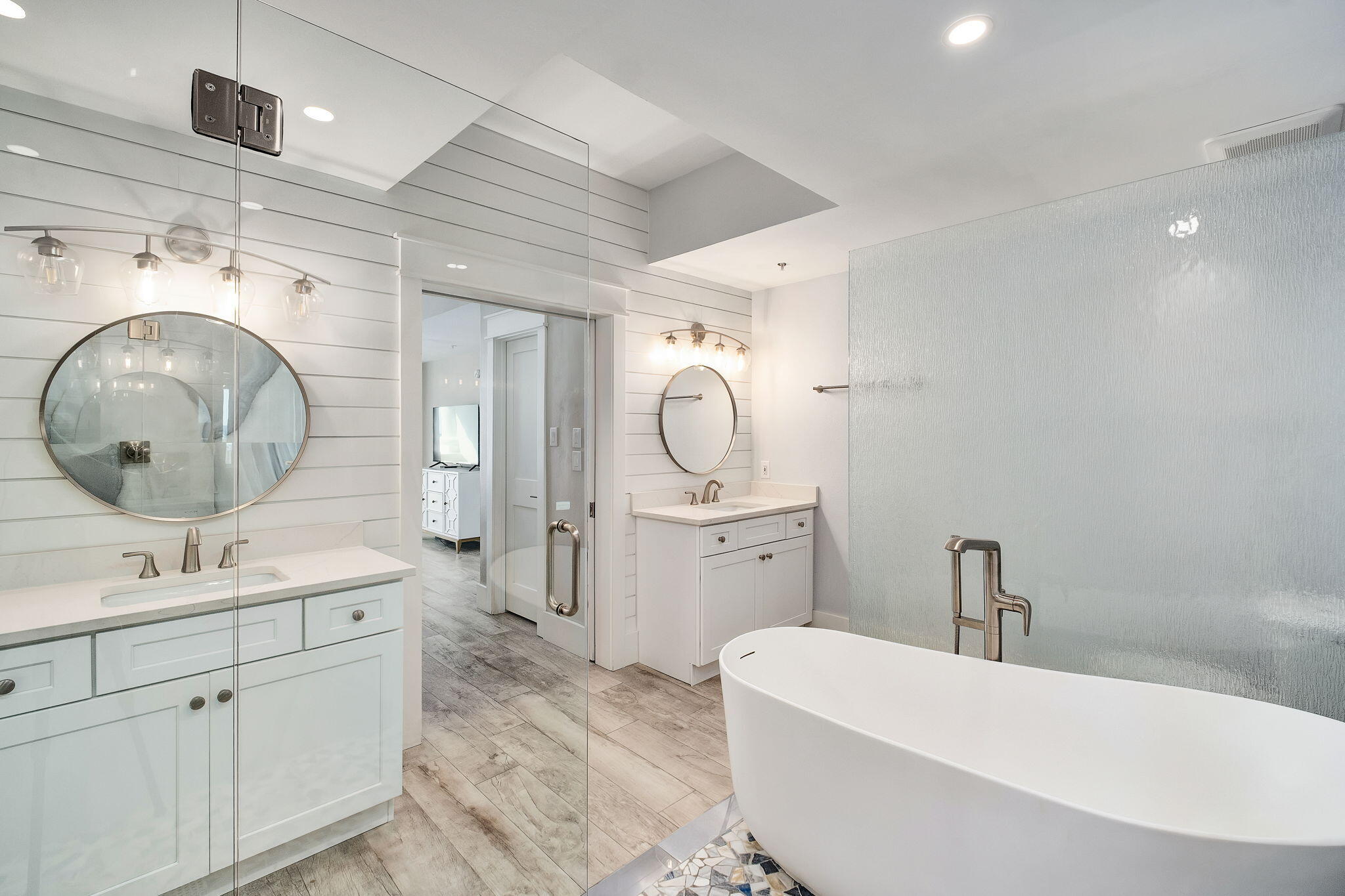 164 Blue Lupine Way, Unit 313 Santa Rosa Beach, FL 32459 - Photo 29 of 57 a bathroom with a double vanity sink mirror bathtub and toilet