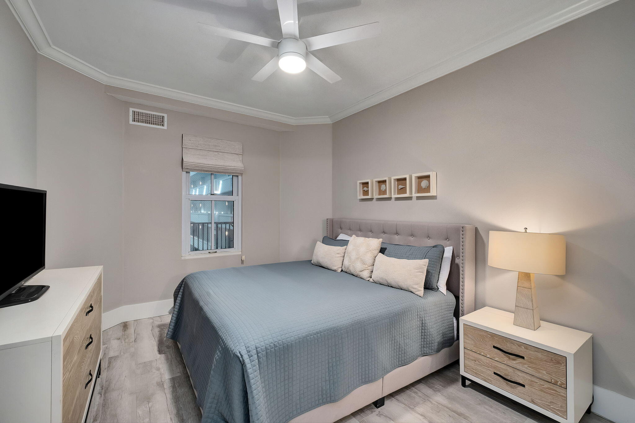 164 Blue Lupine Way, Unit 313 Santa Rosa Beach, FL 32459 - Photo 31 of 57 a bedroom with a bed and a flat screen tv