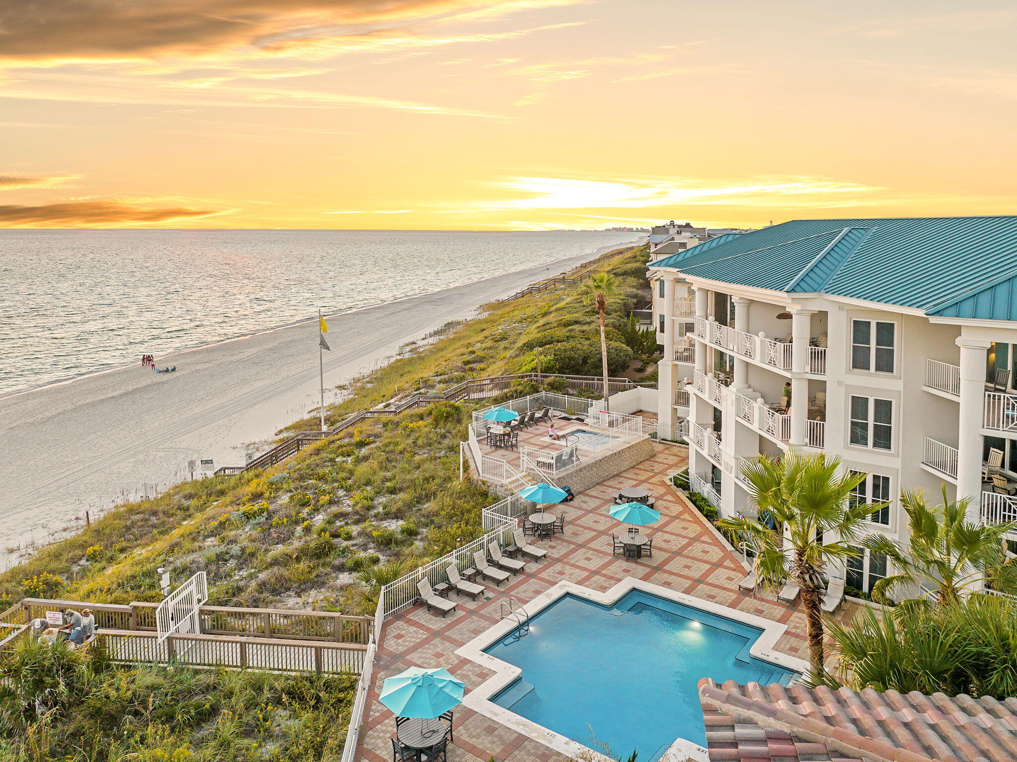 164 Blue Lupine Way, Unit 313 Santa Rosa Beach, FL 32459 - Photo 42 of 57 a view of an ocean with a multi story building