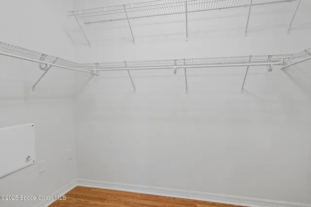 a view of a room with racks on the wall