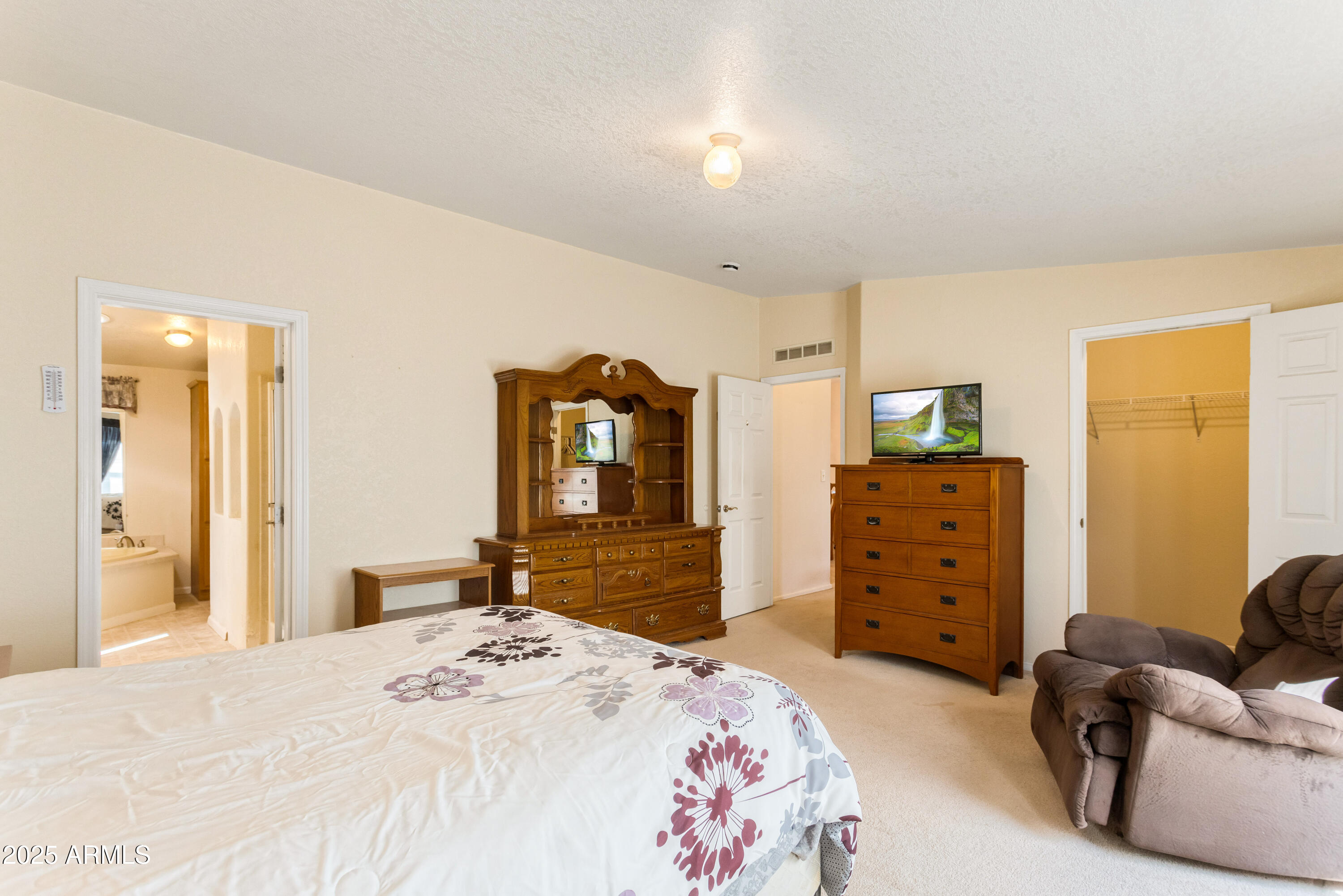 3526 West Rak Road Douglas, AZ 85607 - Photo 15 of 51 a bedroom with a bed and furniture