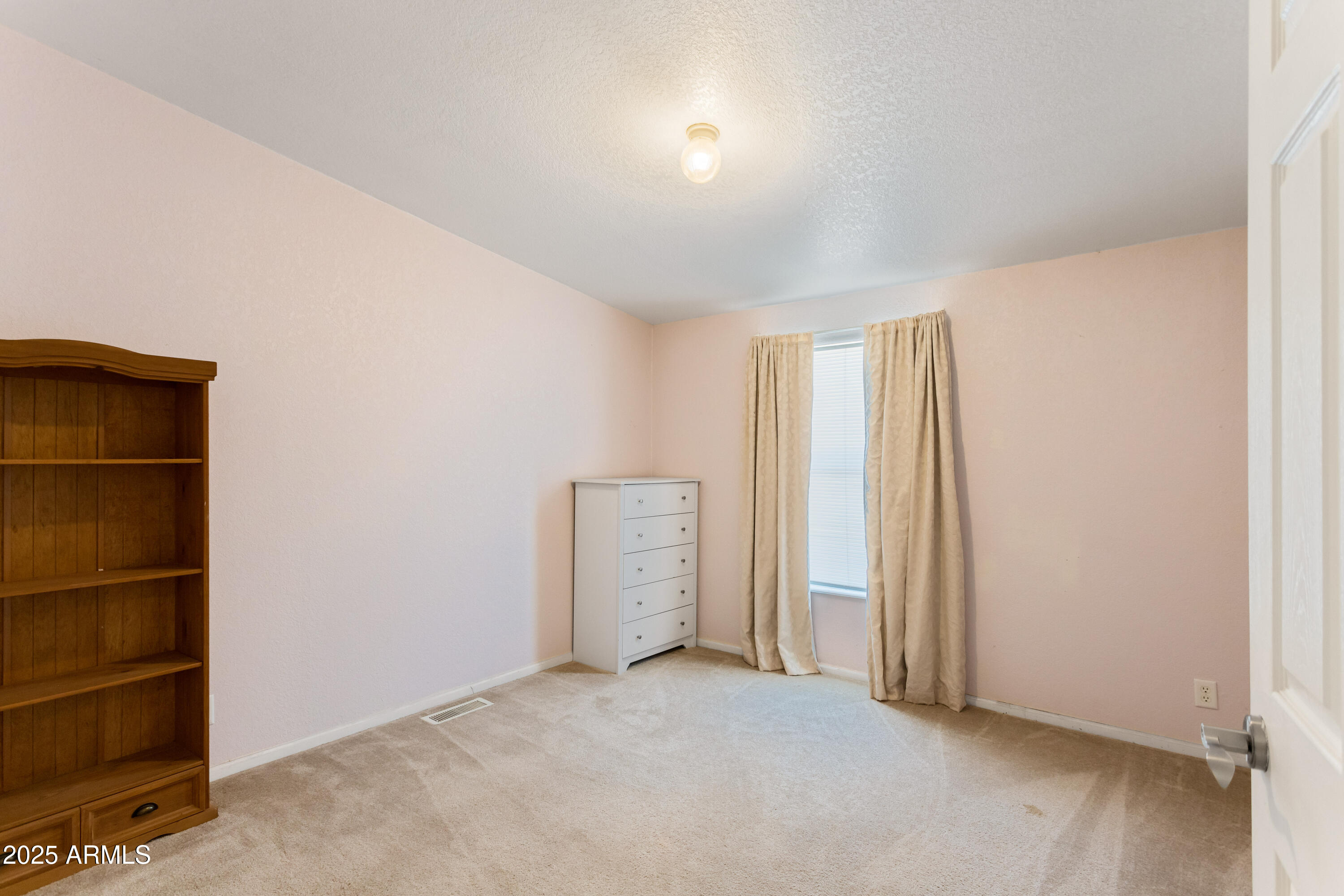 3526 West Rak Road Douglas, AZ 85607 - Photo 21 of 51 an empty room with closet