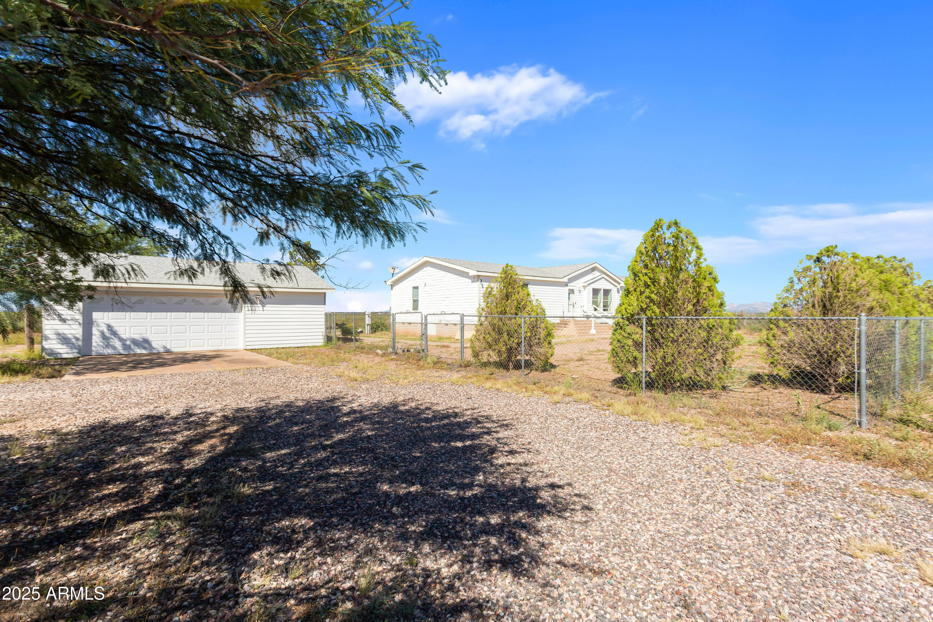 3526 West Rak Road Douglas, AZ 85607 - Photo 32 of 51 a view of road with large trees