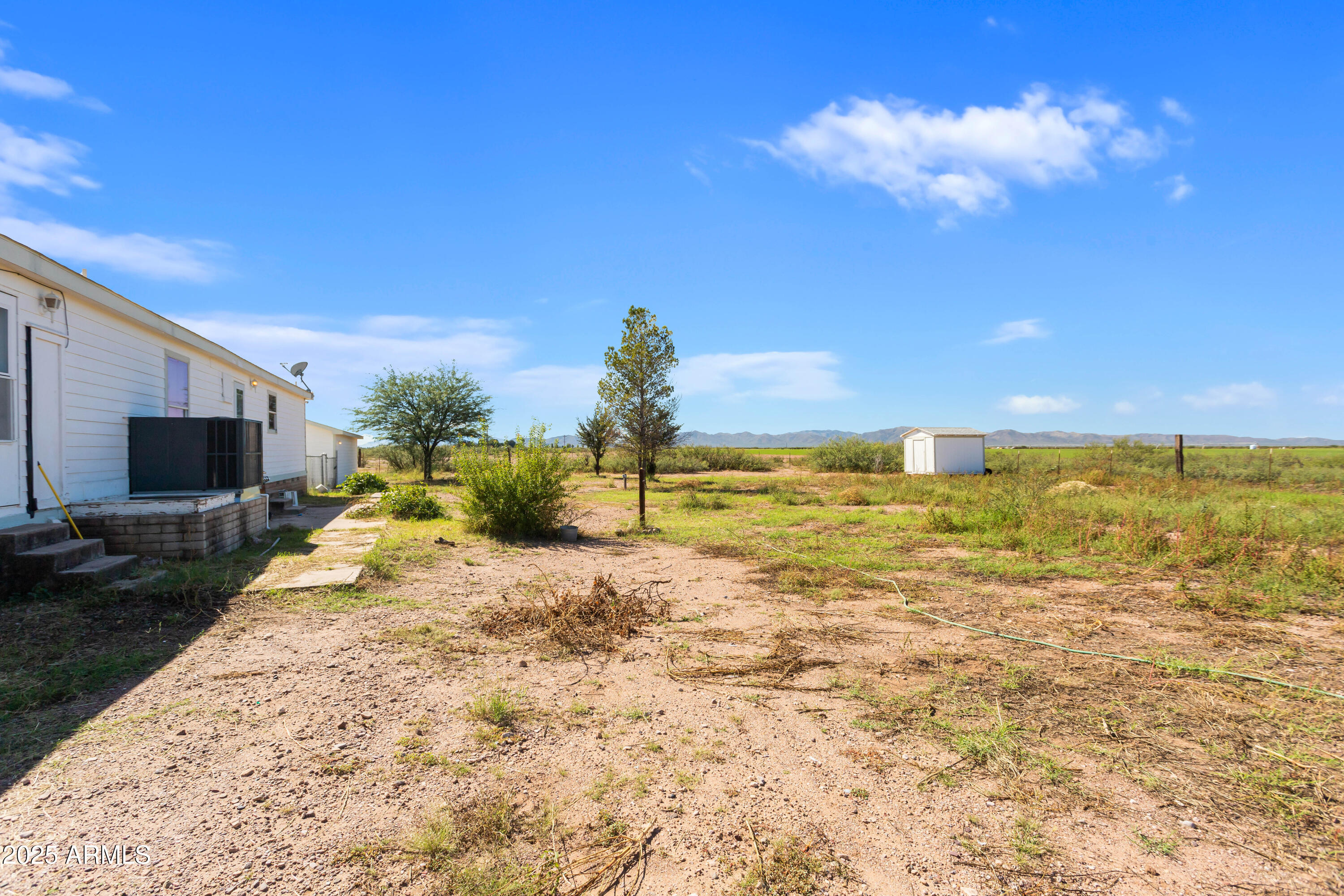 3526 West Rak Road Douglas, AZ 85607 - Photo 37 of 51 a view of a lake with a beach