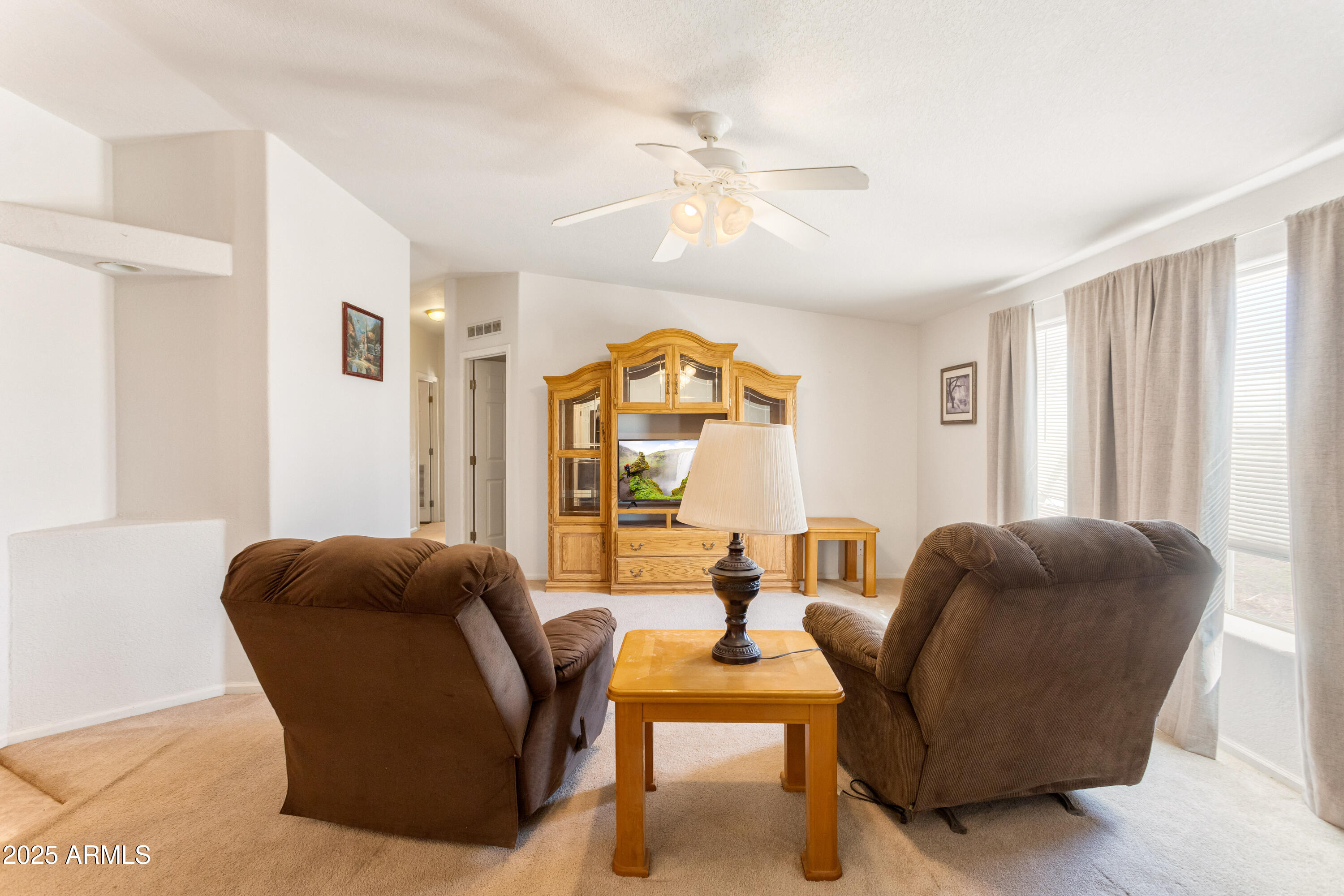 3526 West Rak Road Douglas, AZ 85607 - Photo 5 of 51 a living room with furniture and a large window