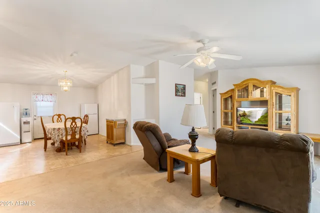 a living room with furniture and a couch