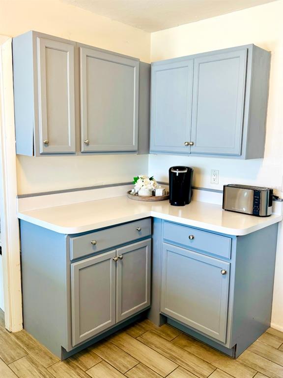 437 Hickory Road Venice, FL 34293 - Photo 12 of 33 a kitchen with cabinets and appliances