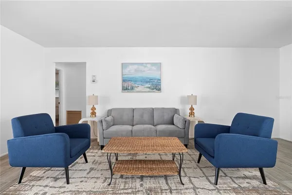 a living room with furniture and a couch