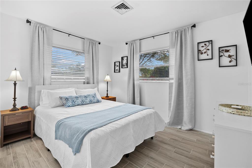 437 Hickory Road Venice, FL 34293 - Photo 22 of 33 a bedroom with a bed and a window