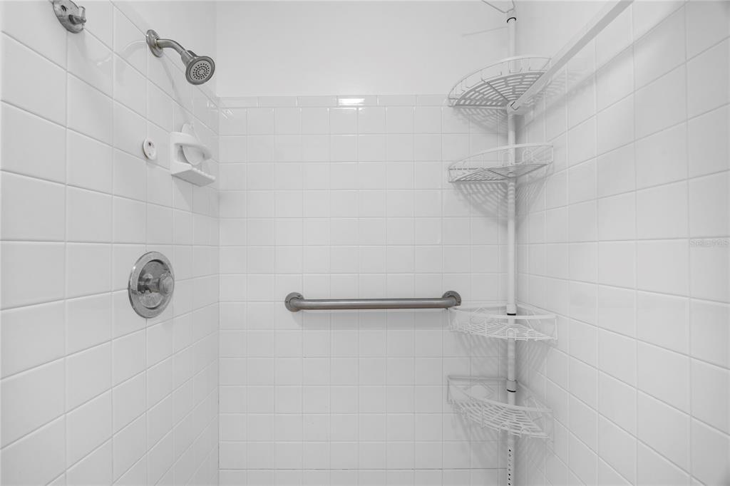 437 Hickory Road Venice, FL 34293 - Photo 26 of 33 a bathroom with a shower