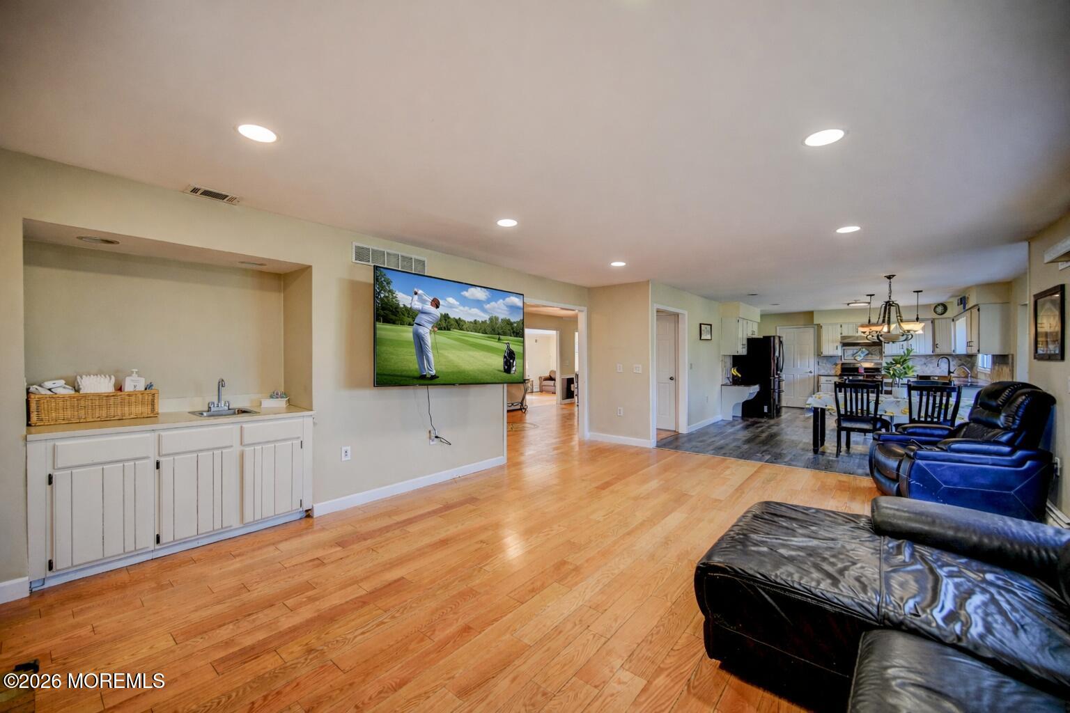23 Red Hawk Road South Colts Neck, NJ 07722 - Photo 21 of 70 21-Family Room to Kitchen