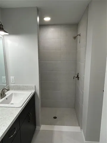 a white toilet sitting next to a window