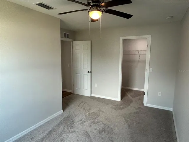 a bathroom with a sink double vanity and a mirror