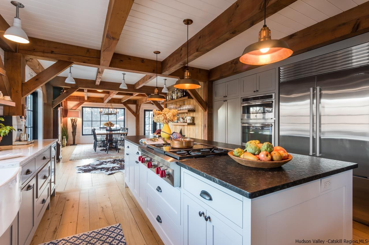 21 Red Oak Lane Garrison, NY 10524 - Photo 14 of 35 a kitchen with sink a stove and cabinets