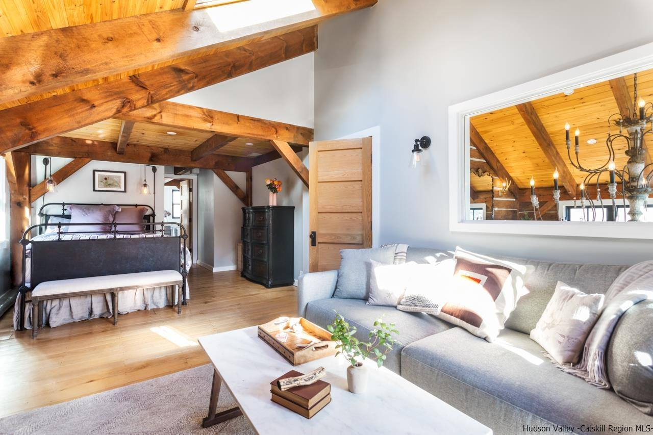 21 Red Oak Lane Garrison, NY 10524 - Photo 18 of 35 a living room with furniture and a large window