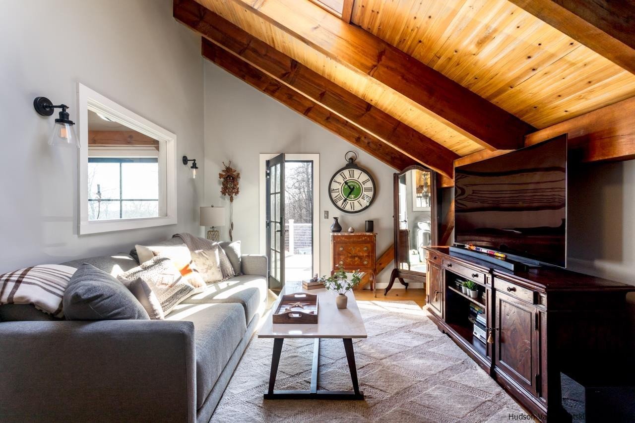 21 Red Oak Lane Garrison, NY 10524 - Photo 19 of 35 a living room with furniture and a flat screen tv