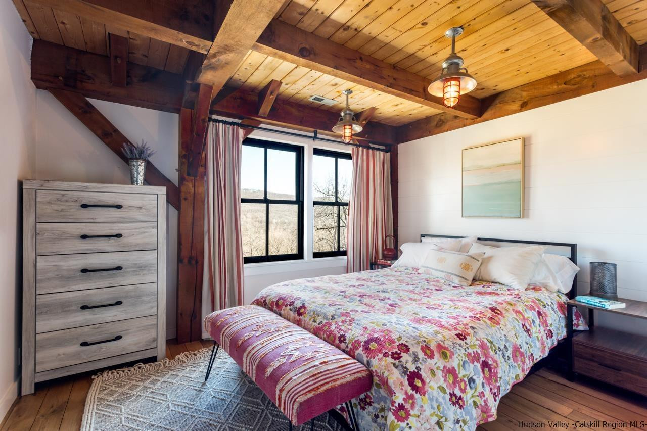 21 Red Oak Lane Garrison, NY 10524 - Photo 23 of 35 a bedroom with a large bed and a window