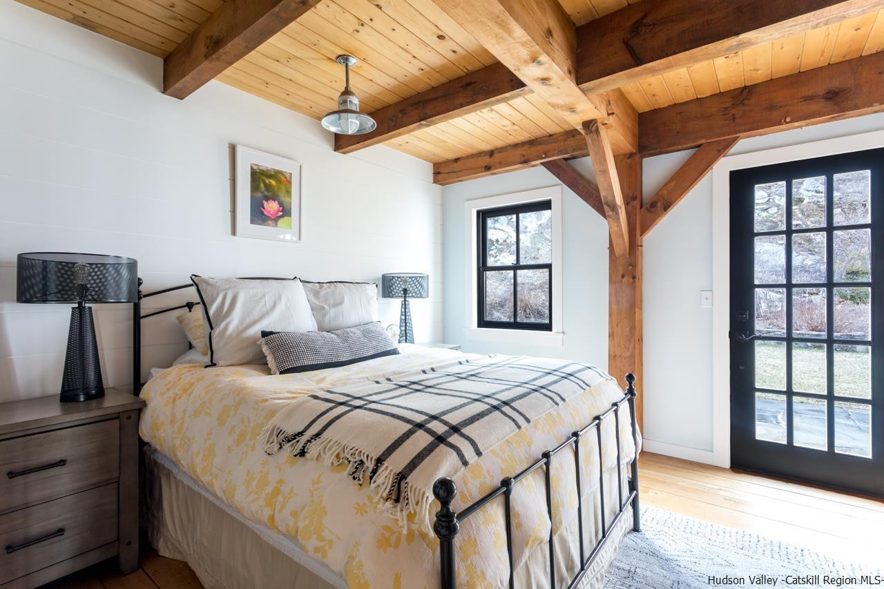 21 Red Oak Lane Garrison, NY 10524 - Photo 26 of 35 a bedroom with a bed and a window