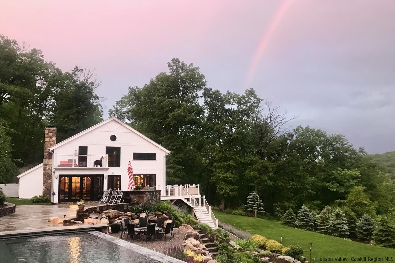 21 Red Oak Lane Garrison, NY 10524 - Photo 34 of 35 a view of a white house with a big yard and large trees