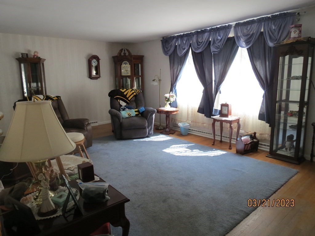 17 Bowl Road Chelmsford, MA 01824 - Photo 2 of 30 a living room with furniture and a window