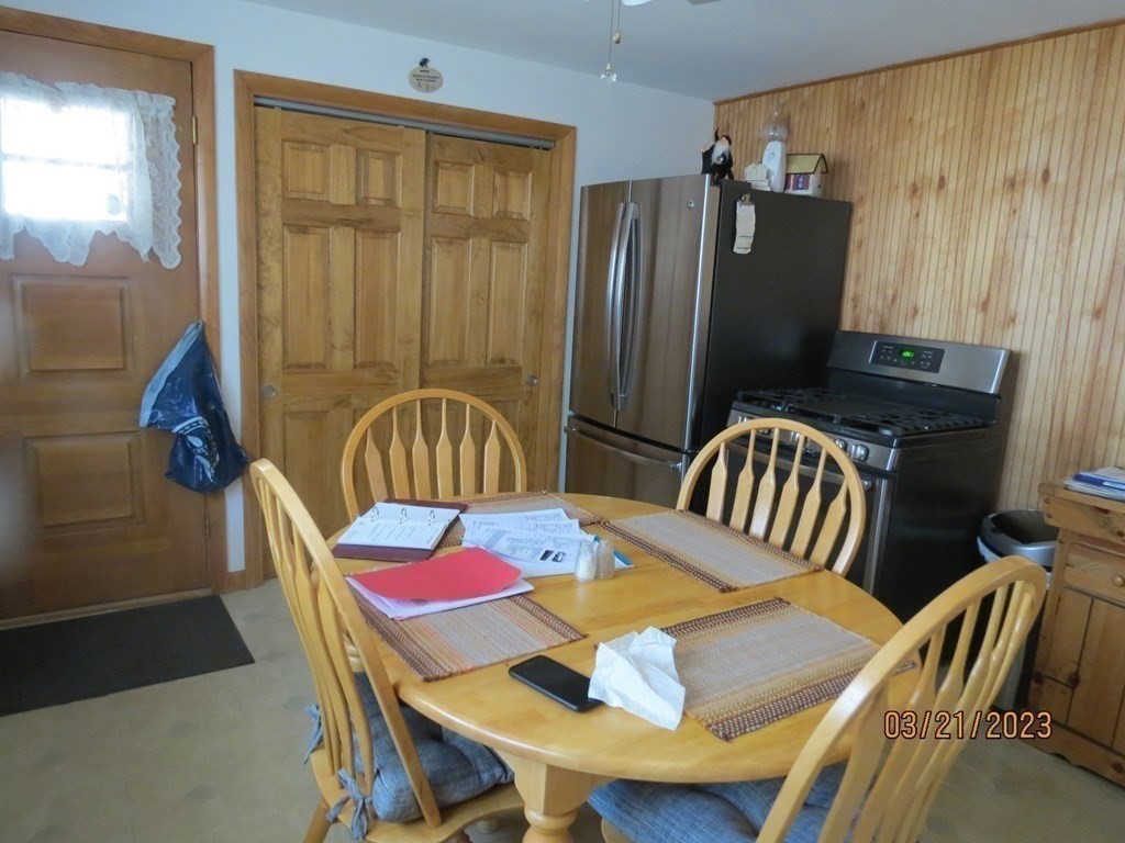 17 Bowl Road Chelmsford, MA 01824 - Photo 7 of 30 a view of a dining room with furniture window and outside view